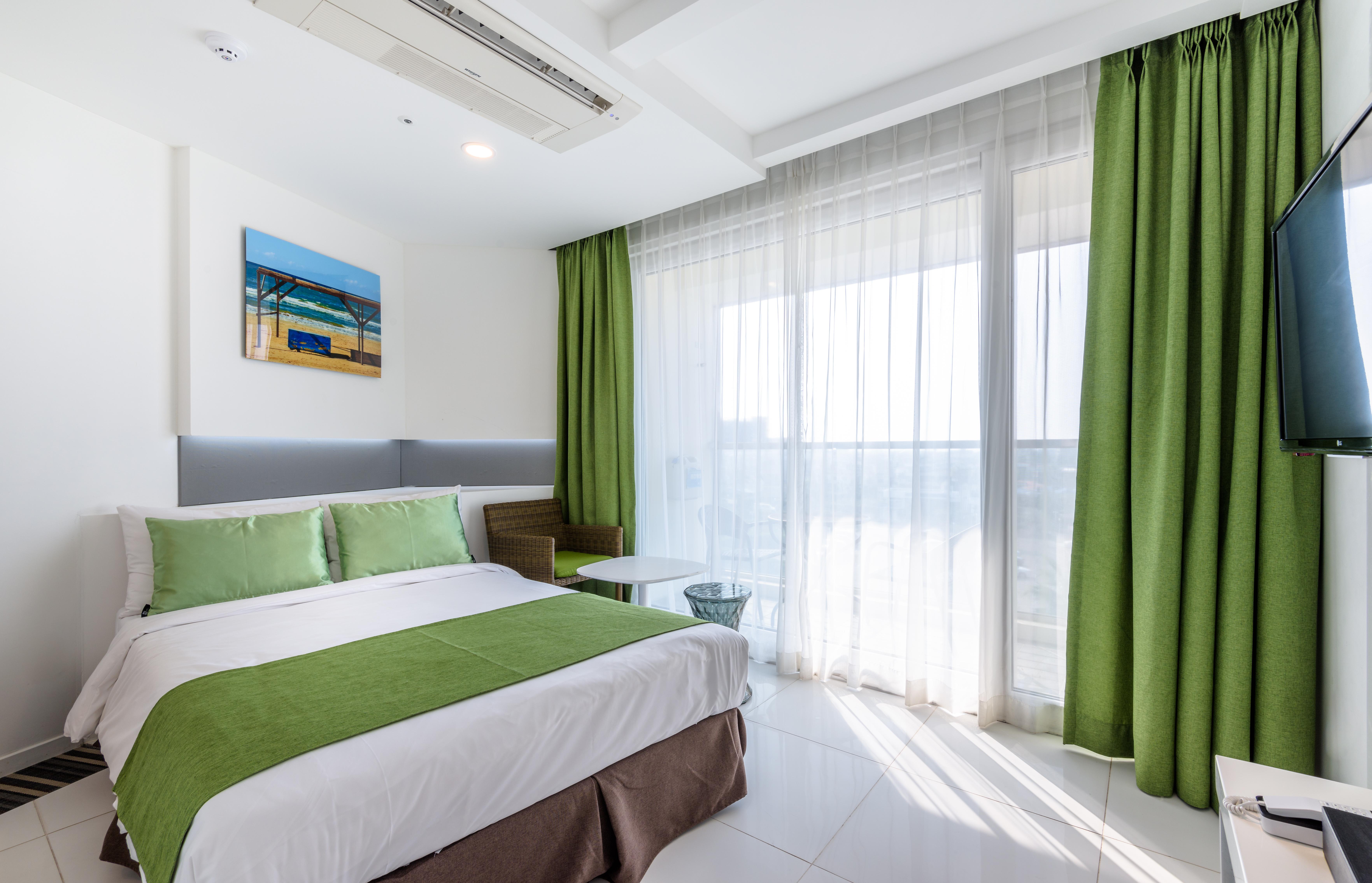 Aimi Jeju Beach Hotel Buitenkant foto